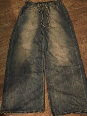 American Bazi Relaxed Wide-Leg Drawstring Jeans in Washed Blue